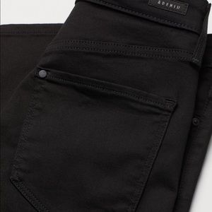 New, without tags. Good stretch, dark black denim